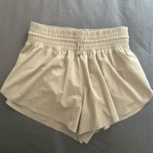 Abercrombie YPB motionTEK Ultra High Rise Lined Flyaway Short in Oat